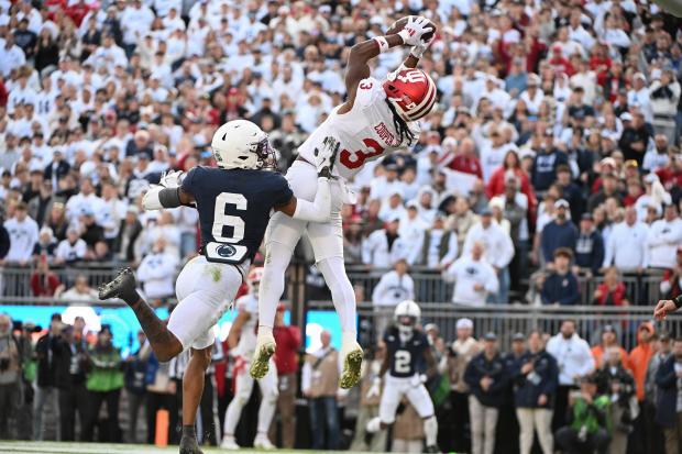 Indiana wide receiver Omar Cooper Jr. (3) catches a touchdown pass over Penn State safety Zakee Wheatley during the fourth quarter Saturday, Nov. 8, 2025, in State College, Pa. (Barry Reeger/AP)