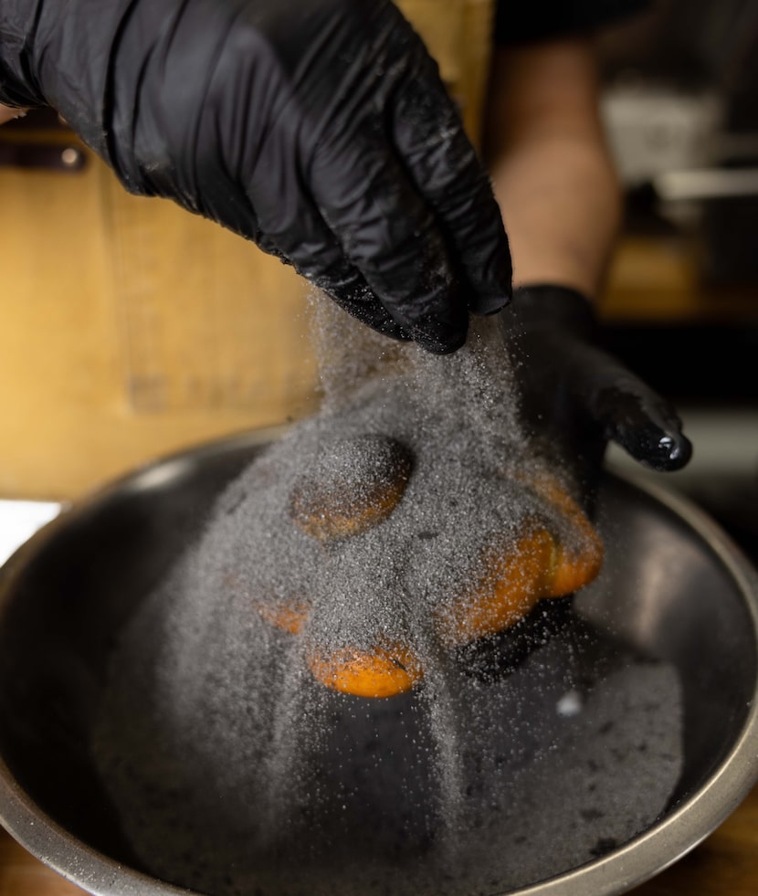 owners and married couple Maria Becerra and Ismael Trejo pan de muerto, the staple bread for...
