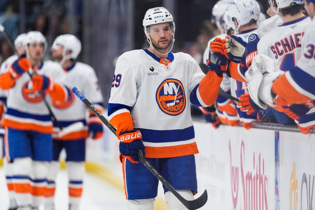 Jonathan Drouin celebrates with teammates after scoring the game-tying goal in the third period of the Islanders' 3-2 overtime road win over the Mammoth on Nov. 14, 2025.