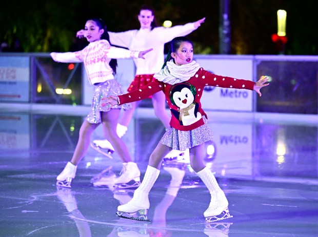 Members of the Los Angeles Ice Theater perform. The Holiday...