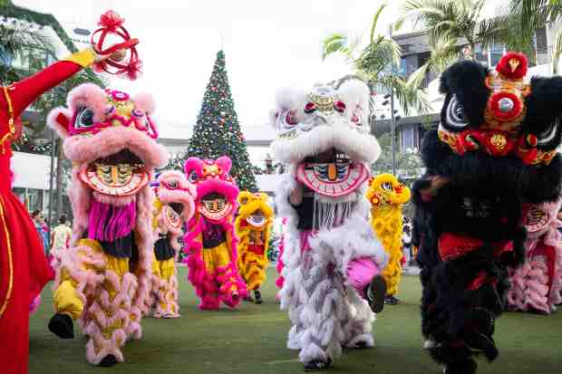 Chinese Lion dancers perform during a preview for Sunday night’s...