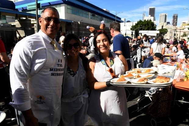David Prentice, Midnight Mission director and CEO, Betty Rodriguez and...