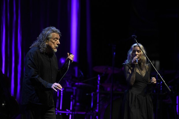 Robert Plant performs with his band, Saving Grace, featuring vocalist...
