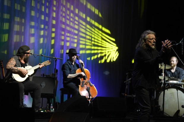 Robert Plant performs with his band, Saving Grace, featuring vocalist...