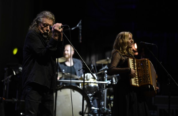 Robert Plant performs with his band, Saving Grace, featuring vocalist...