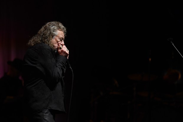Robert Plant performs with his band, Saving Grace, featuring vocalist...