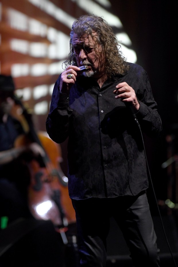 Robert Plant performs with his band, Saving Grace, featuring vocalist...