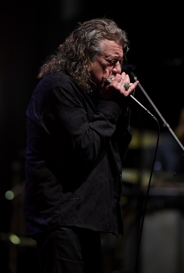 Robert Plant performs with his band, Saving Grace, featuring vocalist...