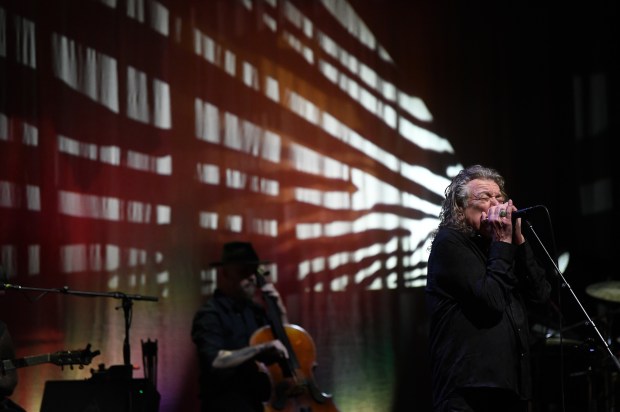 Robert Plant performs with his band, Saving Grace, featuring vocalist...