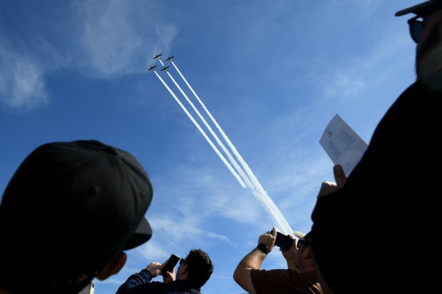 The Condor Squadron performs a ceremonial flyover during the annual...