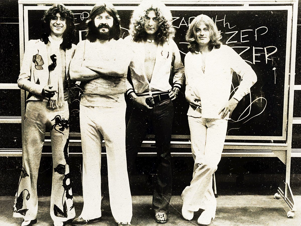 What Led Zeppelin songs are credited to all four members?