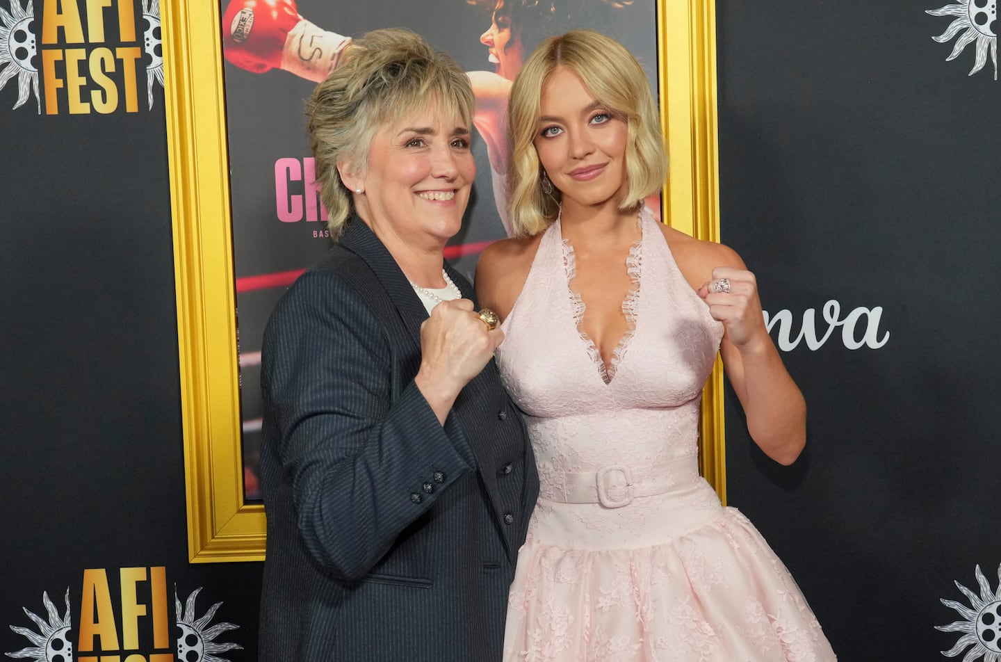 Christy Martin, left, and Sydney Sweeney arrive at the AFI Fest premiere of "Christy" on Oct. 25, at the TCL Chinese Theatre in Los Angeles.