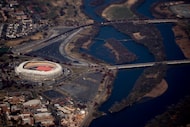 RFK Stadium in Washington, D.C., is visible from Air Force One as it takes off from Andrews...