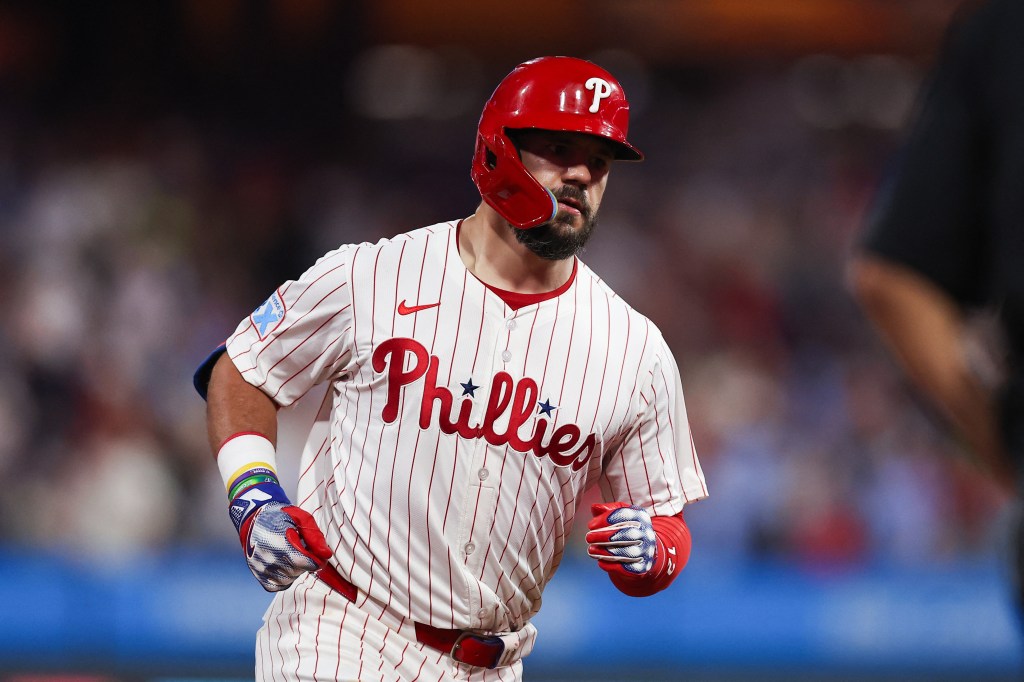 Philadelphia Phillies outfielder Kyle Schwarber (12) runs the bases after hitting a home run during the seventh inning against the Miami Marlins at Citizens Bank Park.
