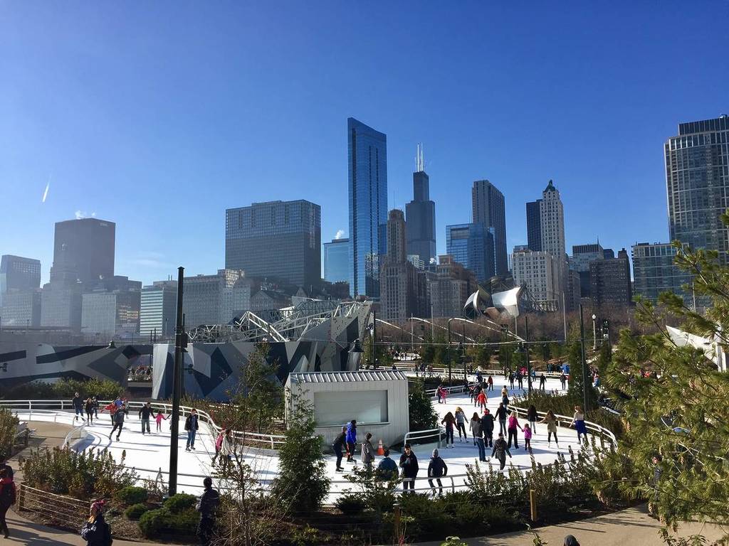 Ice skaters enjoy the Ice Ribbon in Maggie Daley Park