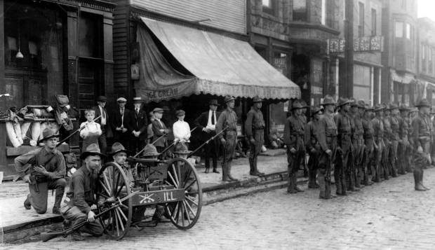 Troops gather at 47th Street and Wentworth Avenue during the...