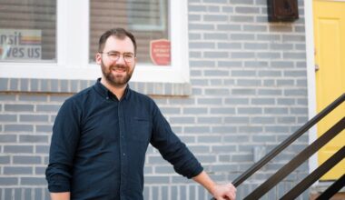 Cameron Lafreniere stands for a portrait outside of his home in Point Breeze on Monday, Nov. 24, 2025.