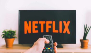 Netflix on tv with remote by freestocks via Unsplash