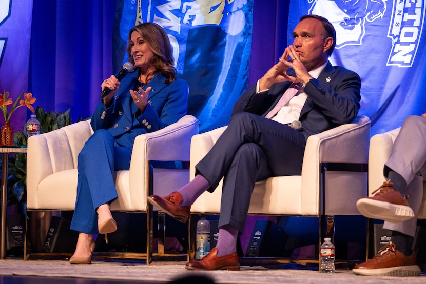 Tarleton State University President James Hurley listens to Texas Wesleyan University...