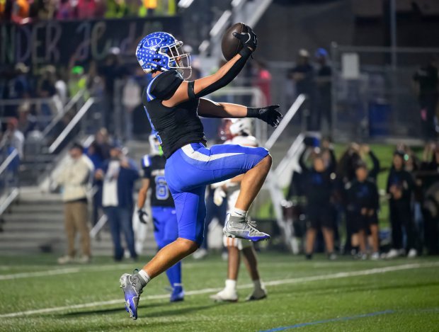 La Habra running back Kevika Mata’Utia- Martinez celebrates as he...