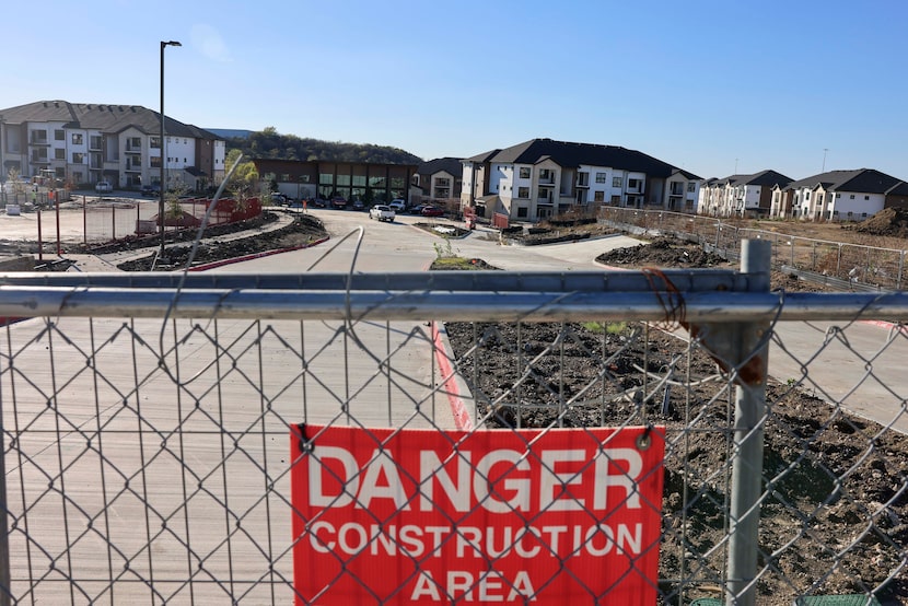 Construction zone of a new apartment complex by interstate 30, on Tuesday, Nov. 25, 2025 in...