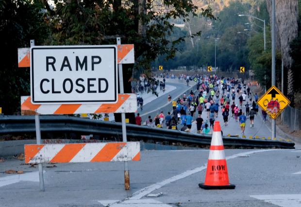 People on foot and bicycles enjoy Arroyo Fest and the use of the 110 Freeway at Ave. 52 on Sunday, Oct. 29, 2023. (Photo by Dean Musgrove, Los Angeles Daily News/SCNG)