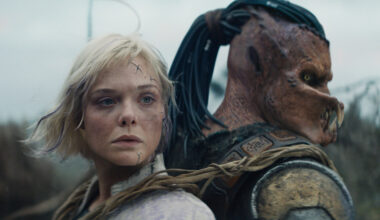 (L-R) Thia (Elle Fanning) and Dek (Dimitrius Schuster-Koloamatangi) in 20th Century Studios' Predator: Badlands