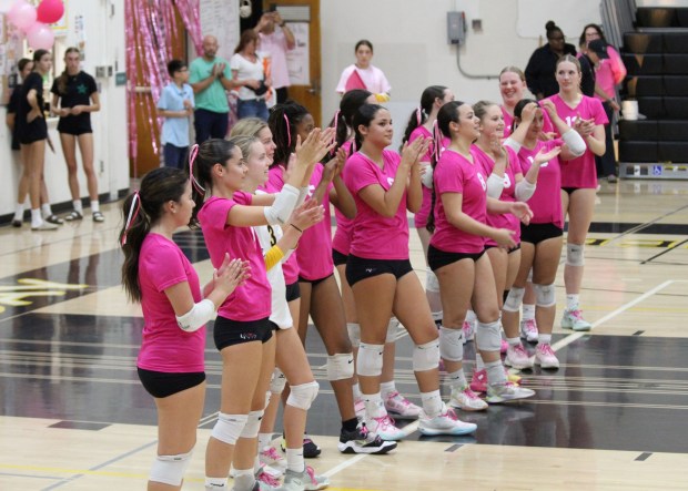 Mission Bay High's women's volleyball team wore pink shirts during their Oct. 7 game as part of their annual "DIG PINK" event to raise awareness about breast cancer. (David Albarian)