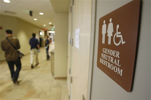 A sign marks the entrance to a gender-neutral restroom at the University of Vermont in Burlington, Vt. (Toby Talbot / AP)