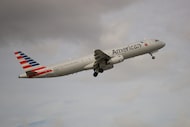 FILE - An American Airlines Airbus A321 takes off from Fort Lauderdale–Hollywood...