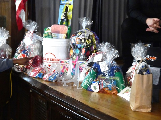 Some lucky families got to take home one of these fabulous gift baskets. (Photo by Rick Cawley)