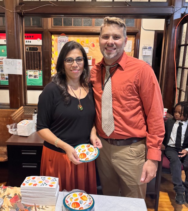 Head of School Dr. Tim Gray and staff member Susan...