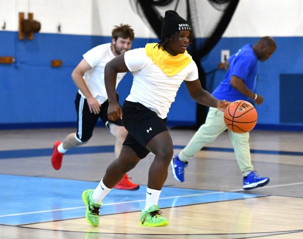Jameer Bellinger leads a Roxborough High fast break. (Photo by...