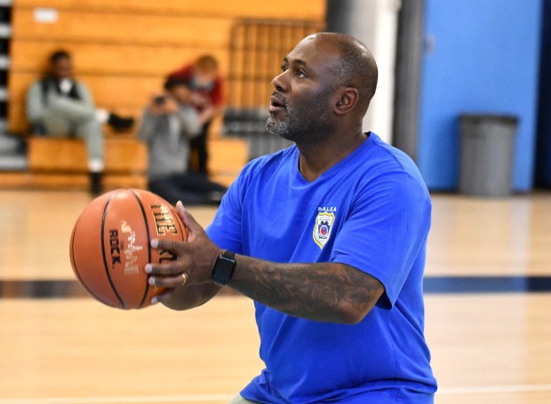 Inspector Jarreau Thomas studies a free throw. (Photo by Rick...