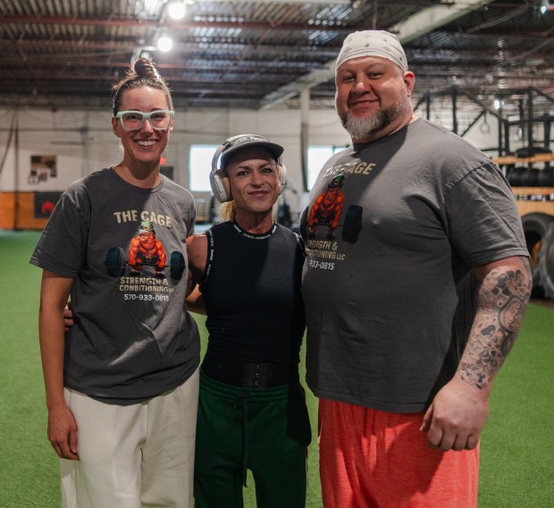 Gym owners Cassandra and Jared Menne along with Renee Covell,...