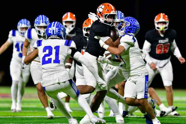 San Jacinto’s Jomini Ransom gets bottled up by La Habra’s...
