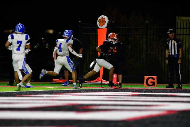 San Jacinto’s Jordan Bernard scores on a pass reception against...