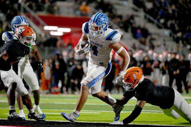 La Habra’s Kevika Mata’Utia- Martinez stomps into the end zone...