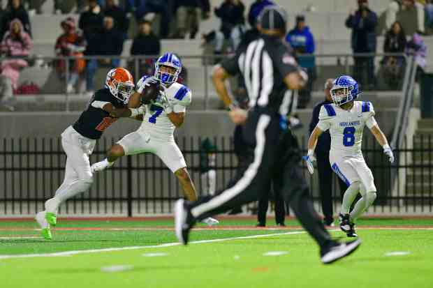 La Habra’s Aaron Castro intercepts a pass intended for San...