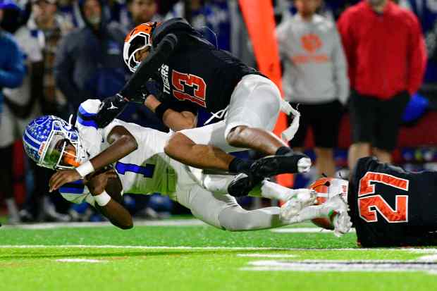 La Habra’s DJ Mitchell and San Jacinto’s Jordan Bernard collide...