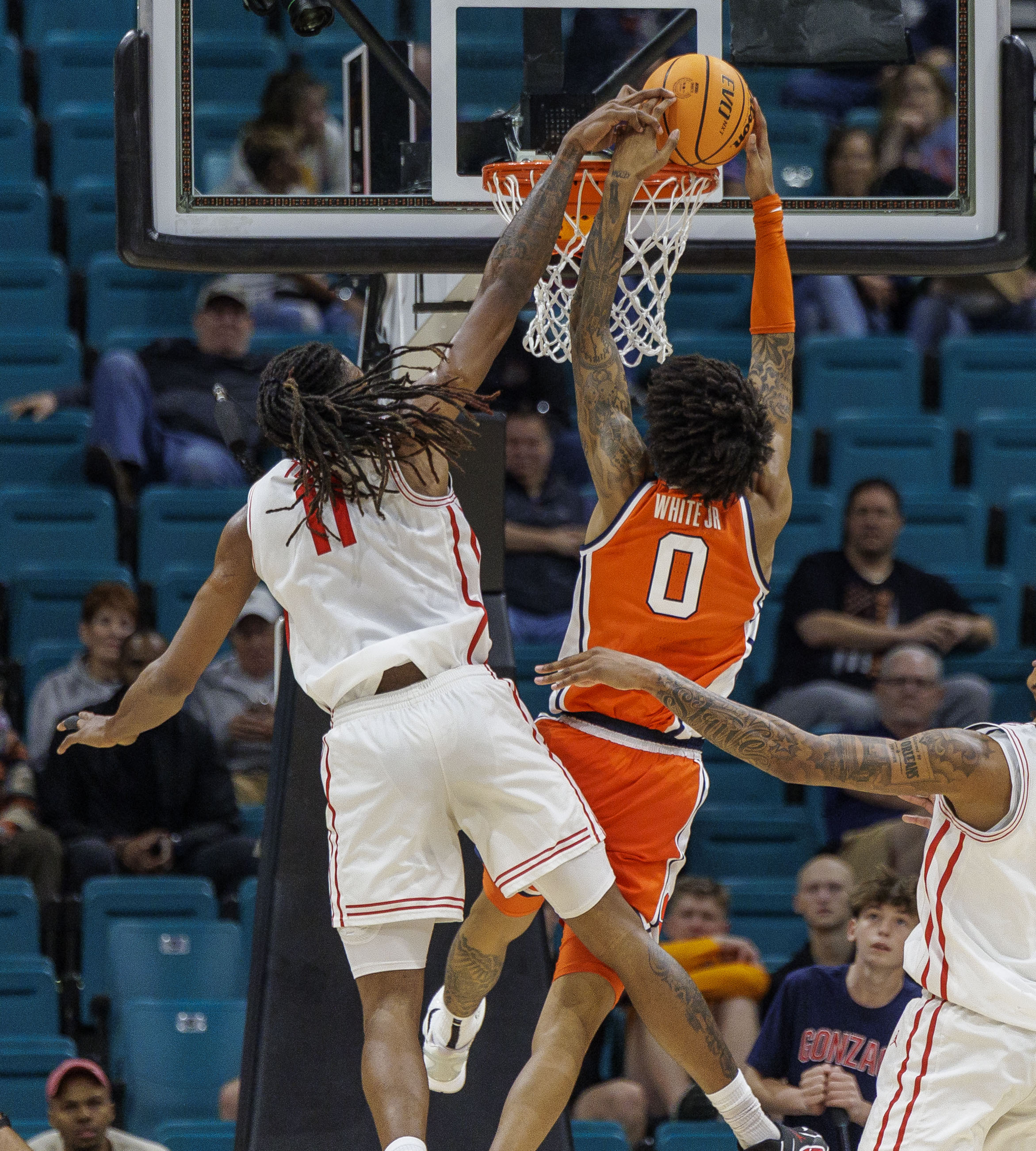 Houston Cougars forward Joseph Tugler (11) grabs Syracuse Orange forward Sadiq White Jr. (0) hand and fouls his dunk as Syracuse takes on Houston in the first round of play in the Players Era Festival at the MGM Grand in Las Vegas Monday, November 24, 2025. (N. Scott Trimble | strimble@syracuse.com)