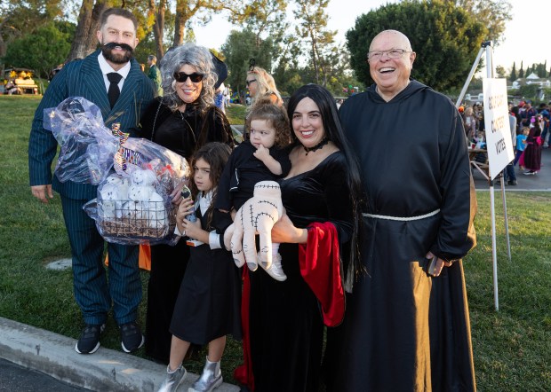 The Ranglas family won the golf cart contest with their...