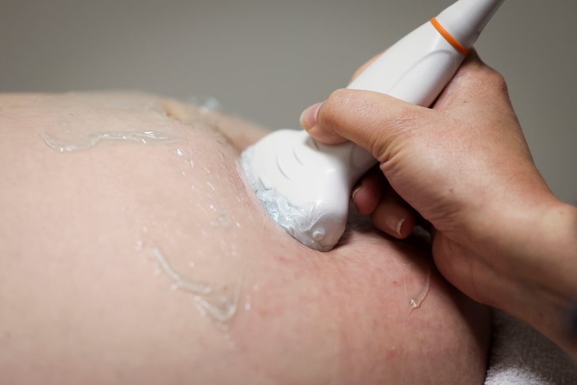 Dr. Jeremy Johnson performs an ultrasound on Bree Ward, on Friday, Aug. 22, 2025, at Faith...