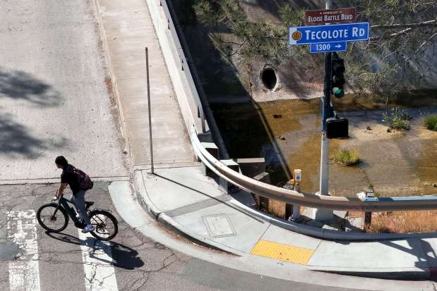 A sign reads "Eloise Battle Blvd." along Tecolote Road and Morena Boulevard seen on Wednesday, May 14, 2025, in San Diego. (Meg McLaughlin / The San Diego Union-Tribune)