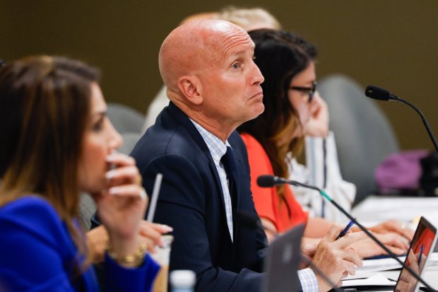 Brett Kalina, executive officer, center, listens during a CLERB meeting at the San Diego County Administration Center on Tuesday, Sept. 3, 2024, in San Diego. (Meg McLaughlin / The San Diego Union-Tribune)