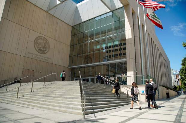 People coming and going at the San Diego Superior Court's Central Courthouse in downtown San Diego. (Alejandro Tamayo / U-T file)