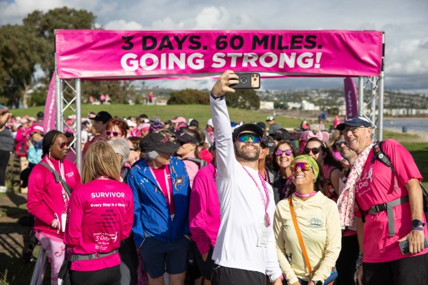 Walkers line up at the start for the final day of the Susan G. Komen 3 Day Walk in San Diego on Sunday, Nov. 16, 2025. (Zoë Meyers / For The San Diego Union-Tribune)