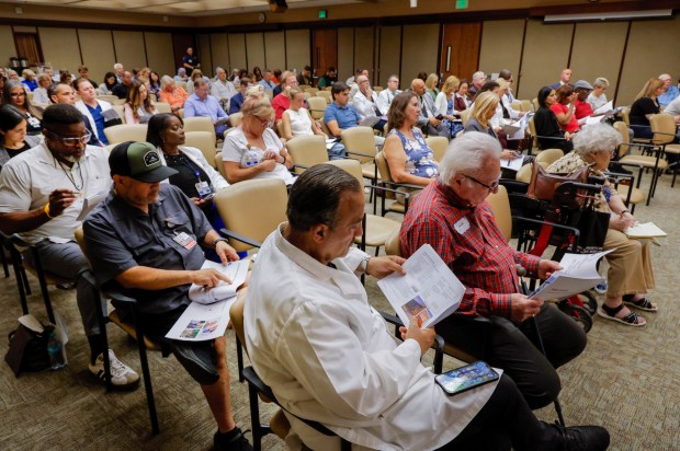10/30/2025_OCEANSIDE, CA_The first community forum on the Sharp HealthCare and Tri-City Medical Center affiliation agreement at the Tri-City board meeting room- Overall view of the crowd during the meeting. (Charlie Neuman / For The San Diego Union-Tribune)