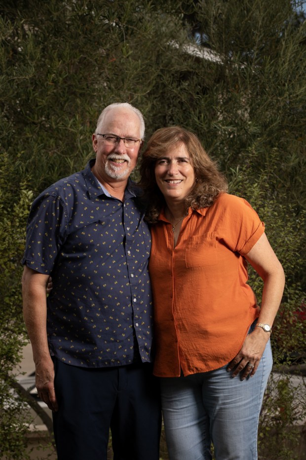 Santee residents Tom Clarke, left, and Karen Fleck knew they wanted an outdoor space that had beautiful aesthetics, was welcoming and was functional for their social gatherings. (Ana Ramirez / The San Diego Union-Tribune)