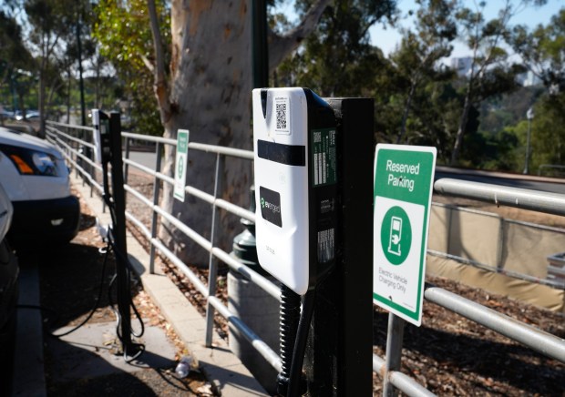 A set of EV chargers is located in the parking lot of the Balboa Park Fleet Science Center in San Diego, CA, on Friday, Oct. 31, 2025. (Nelvin C. Cepeda / The San Diego Union-Tribune)